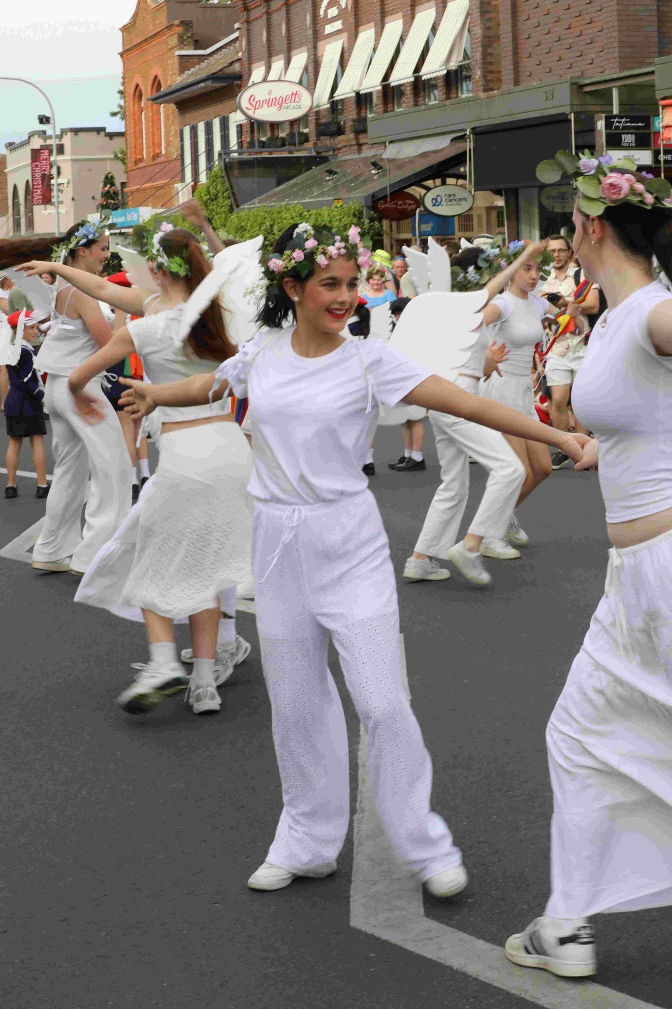 Who needs a dance floor when you have Bowral’s entire main street to bust a move? Picture Stuart Carless.