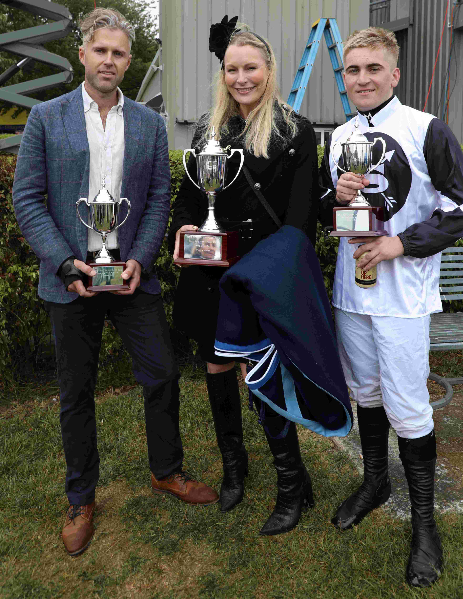 Trainer Anthony Warren, owner Karen Shadbolt and jockey Sebestian Galea pictured with their trophies at Bong Bong on Friday afternoon. Picture Stuart Carless.