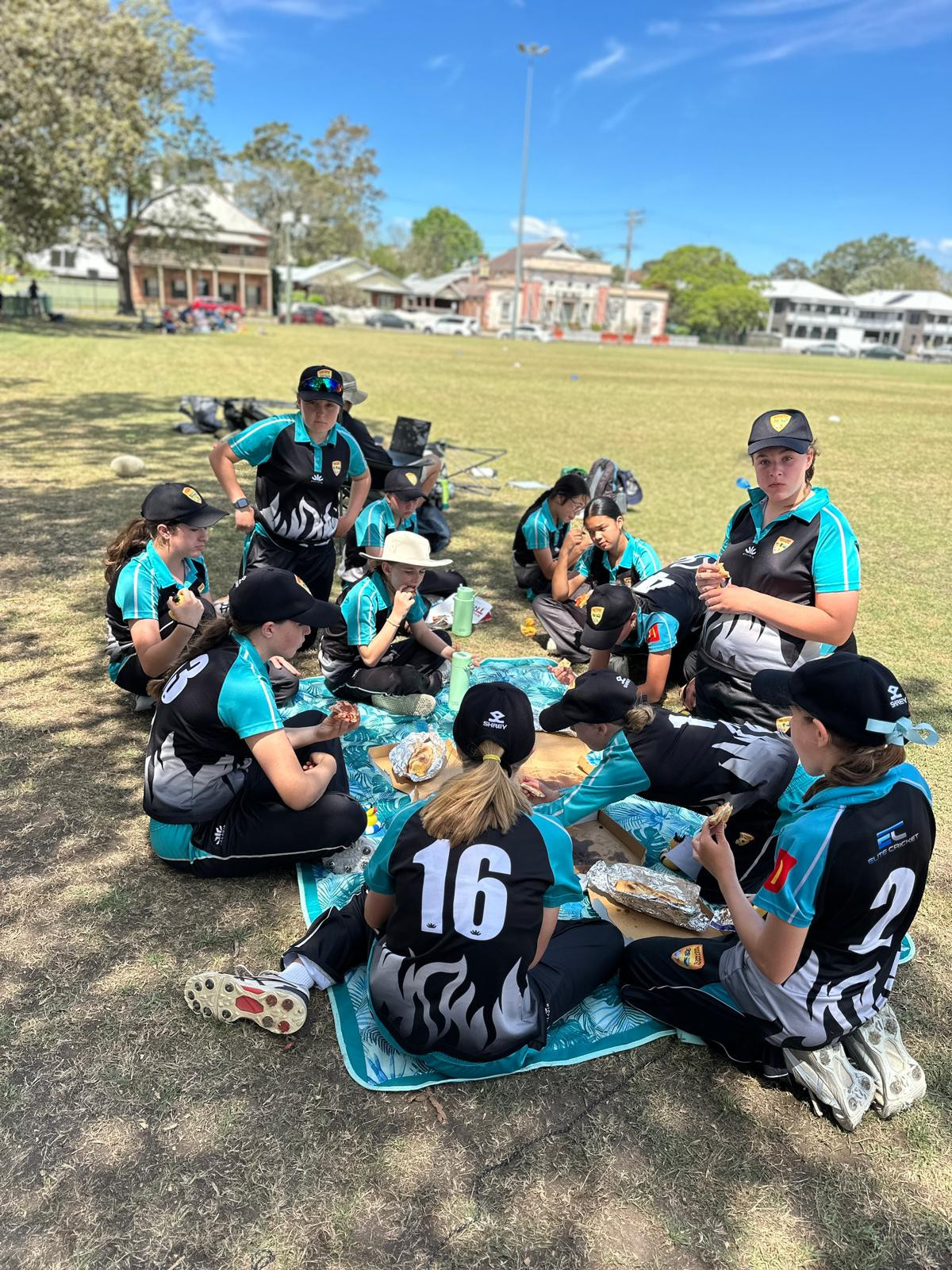 The team relaxing during a break
