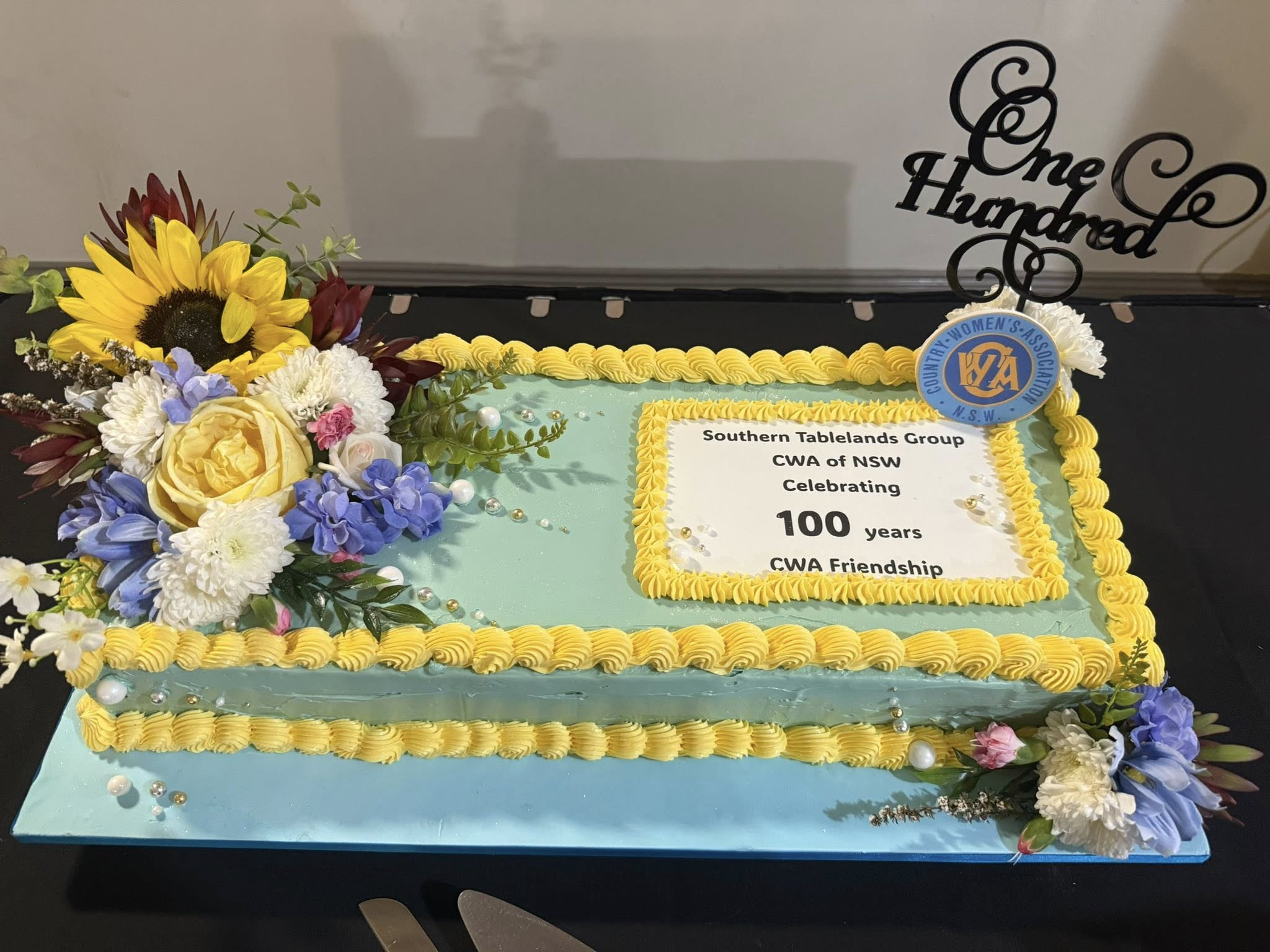 The colourful and delicious looking centenary cake. (Photo: Facebook)