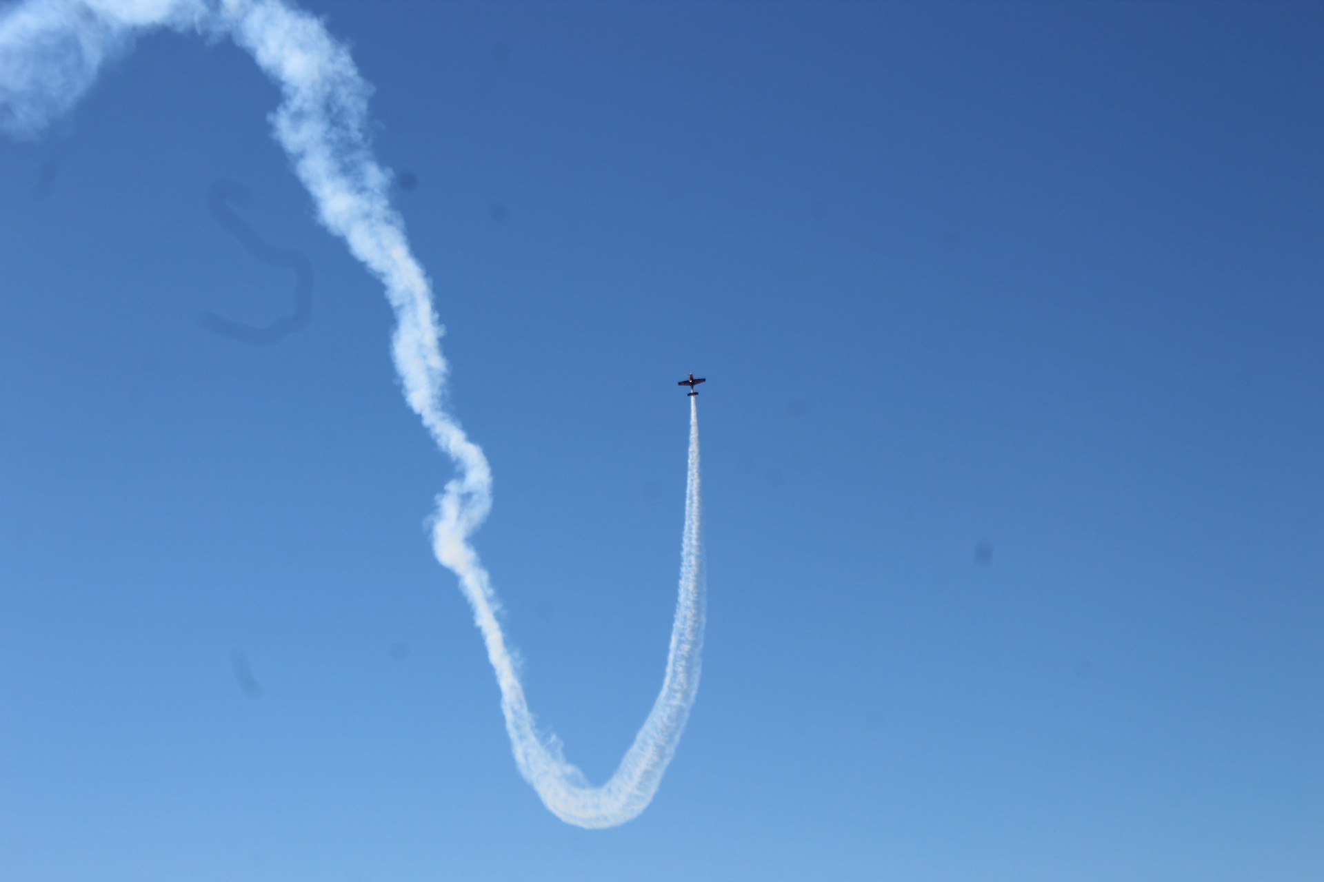 Red Bull’s Matt Hall pulls some acrobatic moves in his plane.