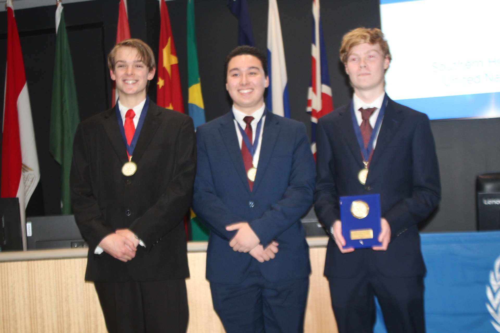 Southern Highlands Christian School students Luke Hilaire (left), Chris Leach and Sam Skinner, the winners of the overall debate with the Rotary Peace Prize.
