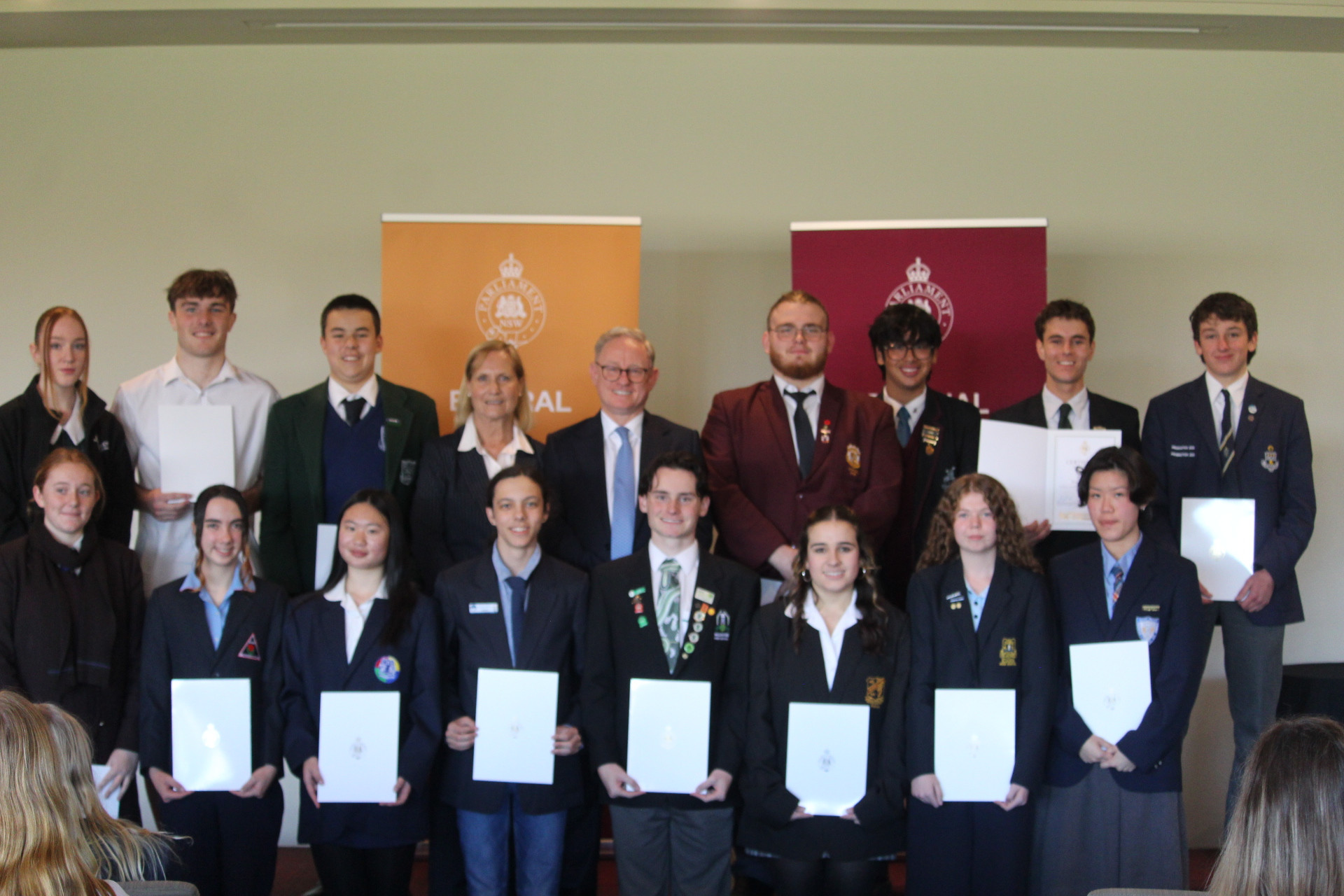 Member for Wollondilly, Judy Hannan and President of the NSW Legislative Council Ben Franklin (4th and 5th from left) pose for a group photo with all the public speaking students. (Photo: Antony Dubber)