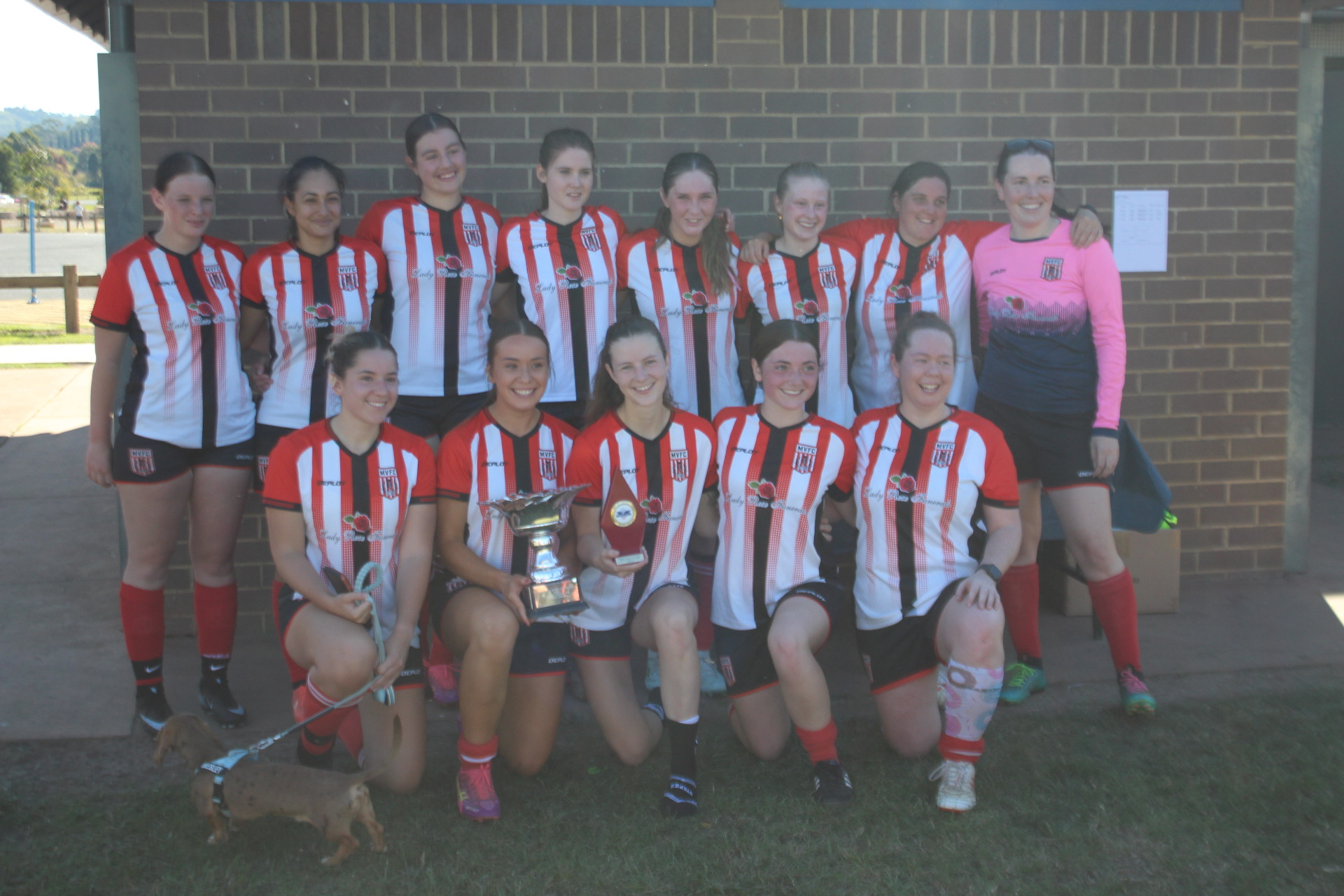 The Moss Vale women celebrate their 7 -1 win against Hill Top.