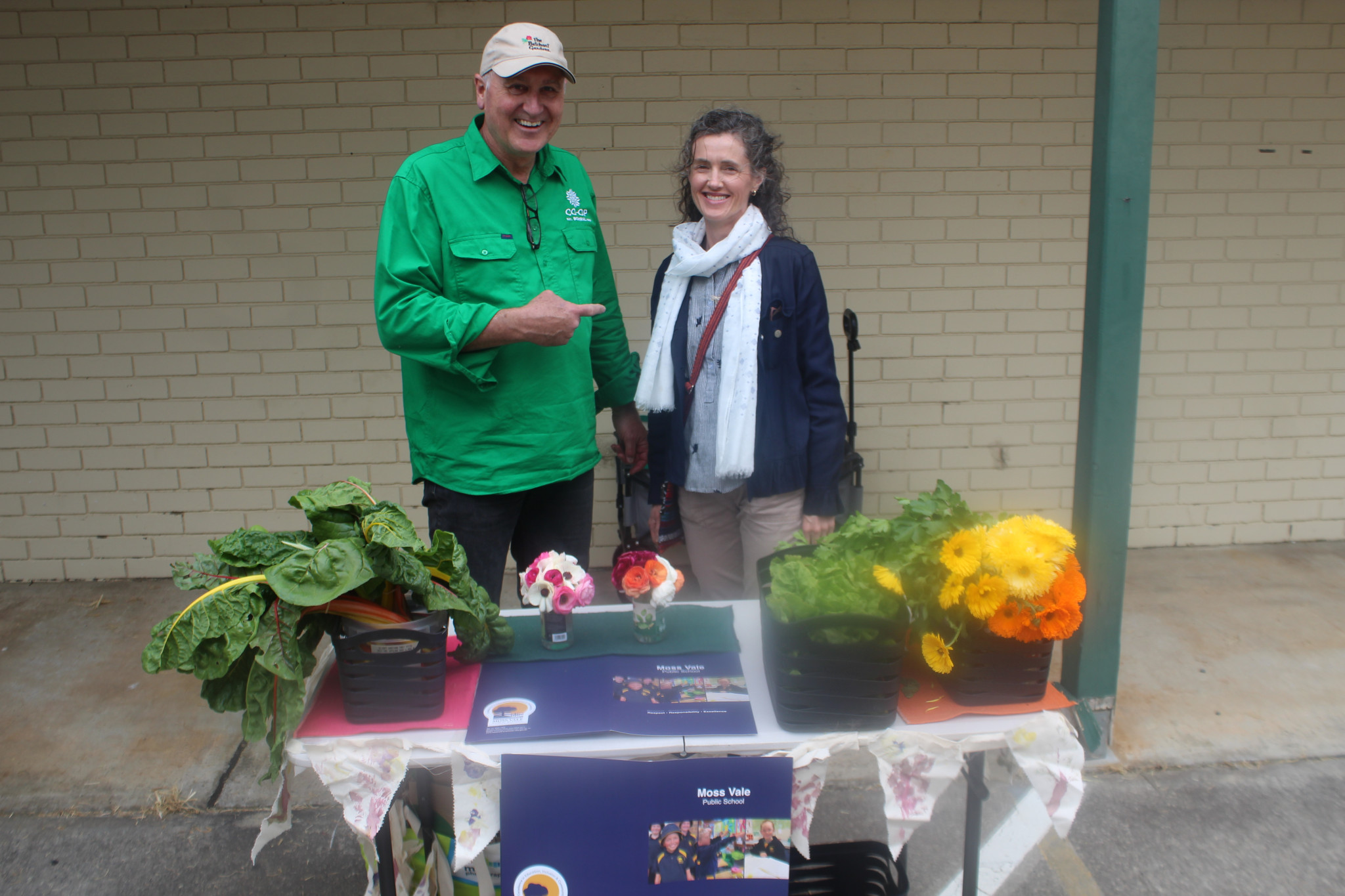Bowral Co-Op General Manager, Greg Welsh (left) with Marnee Harlor from the Moss Vale Public School Community Garden stall. (Photo: Antony Dubber)