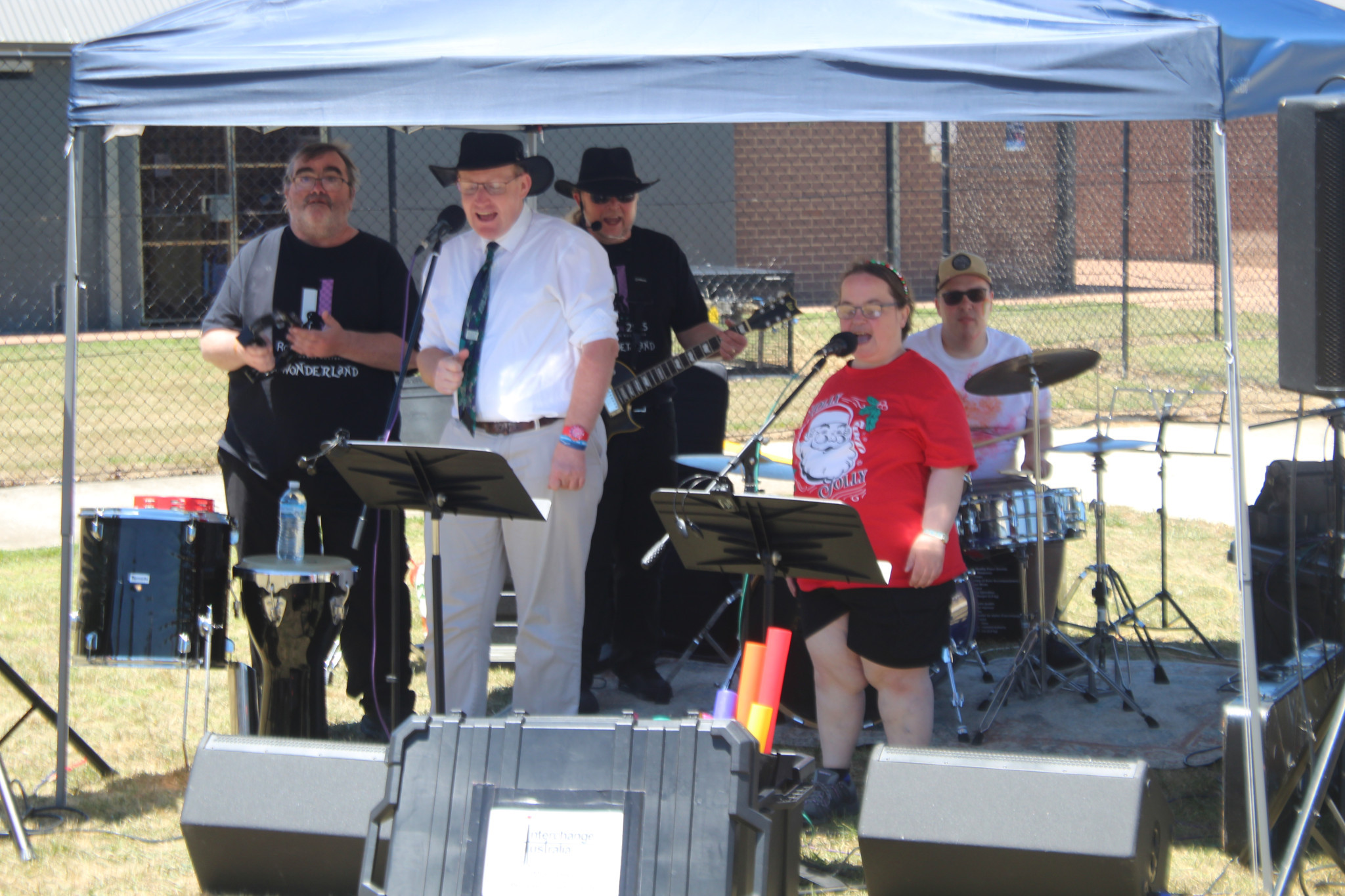 Interchange Australia band 'Higher than High' with Musical Director Tim Dickson (on guitar wearing hat) perform as part of International Day of People with Disability (IDPwD). (Photo: Antony Dubber)