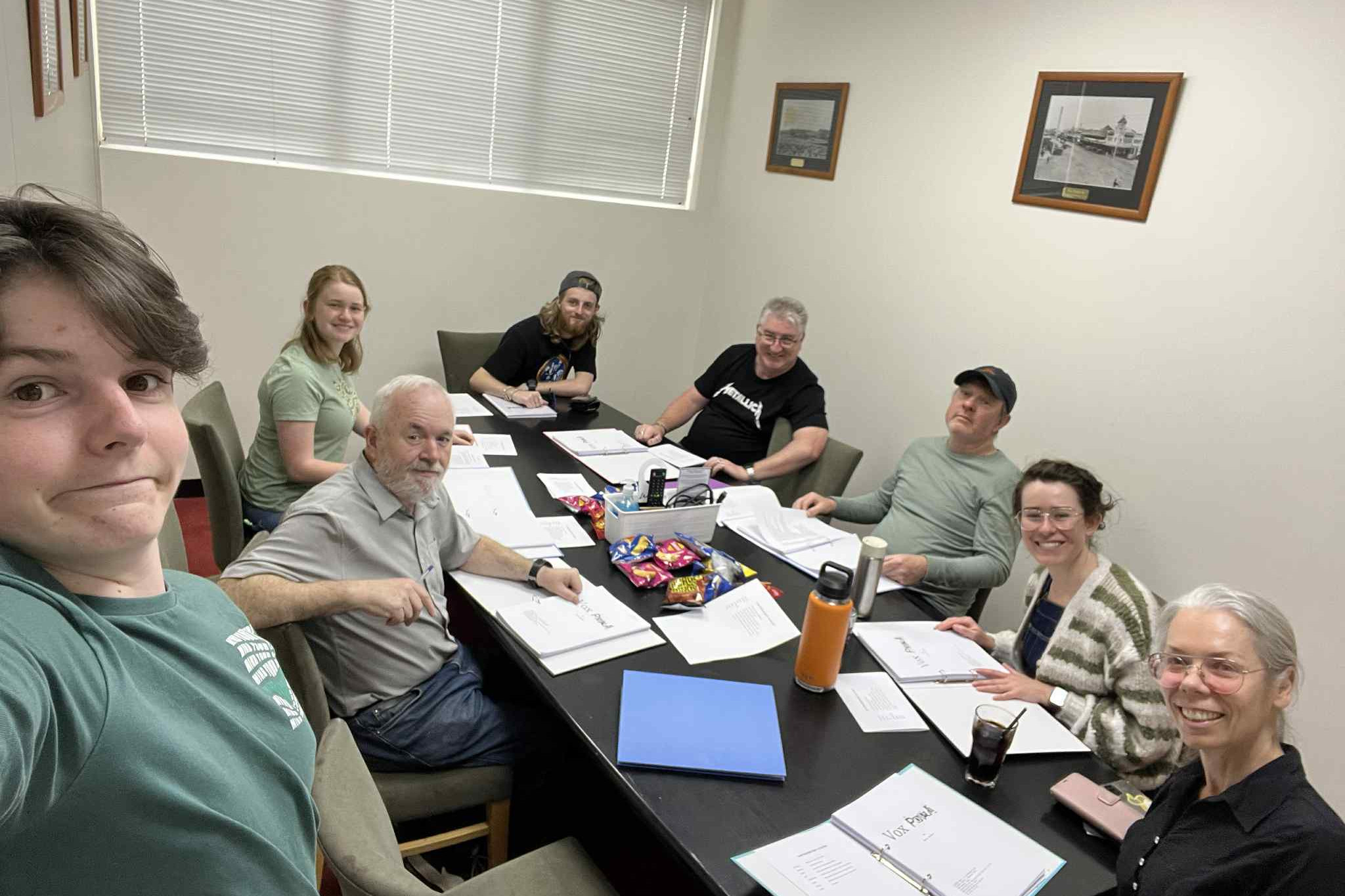 Director for new theatre company Mulwaree Amateur Dramatic Society's upcoming production, Ant Lewis (fourth from right) does a table read with writer Chris Gordon (second from left) and the rest of the MADS team. (Photo: supplied)