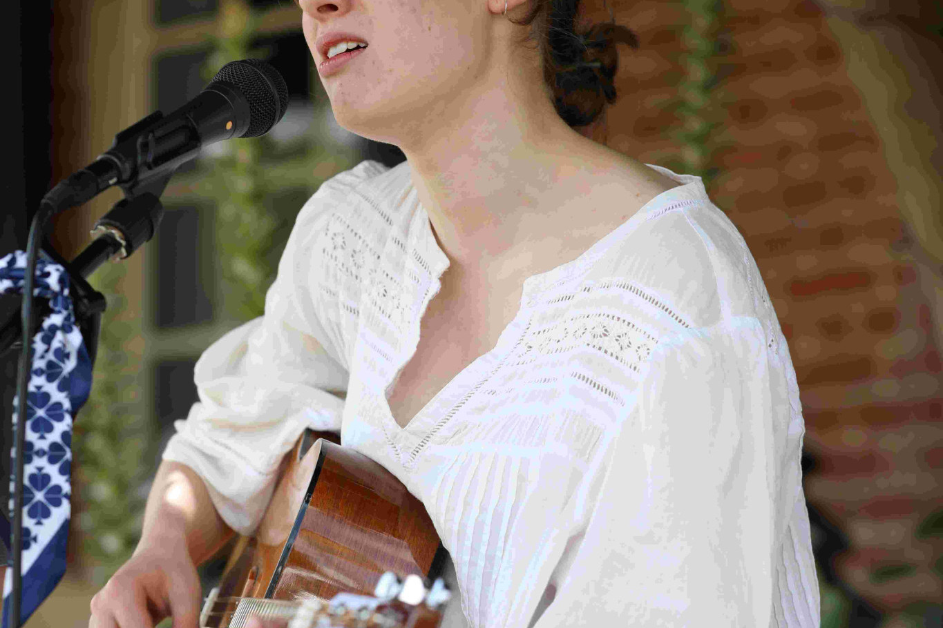 Eighteen-year-old Freya Clohessy of Bowral busking at the recent Australia Day celebrations in Berrima. Photo Stuart Carless.