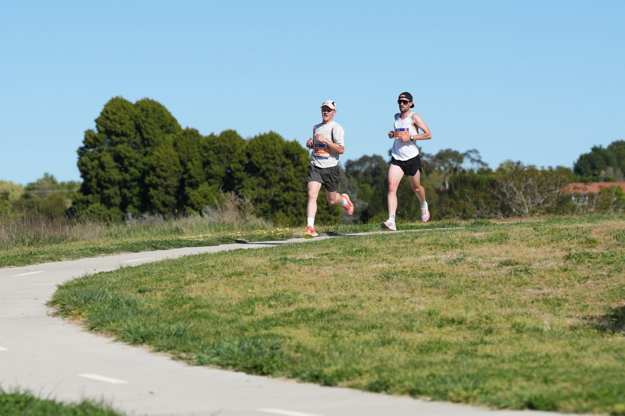 First place runner Jonathon Moore (left) and Cameron Roberts (Second) come around the bend on the Goulburn Walking Track during the Goulburn Half Marathon on Sunday. (Photo: supplied)