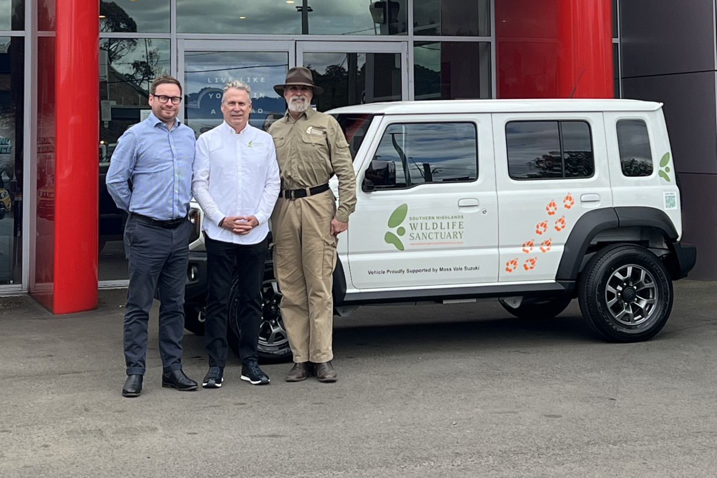 General Sales Manager at Moss Value Suzuki, Brian Higgins pictured with Peter Lewis and John Creighton from the Southern Highlands Wildlife and the new Jimny XL. Supplied.