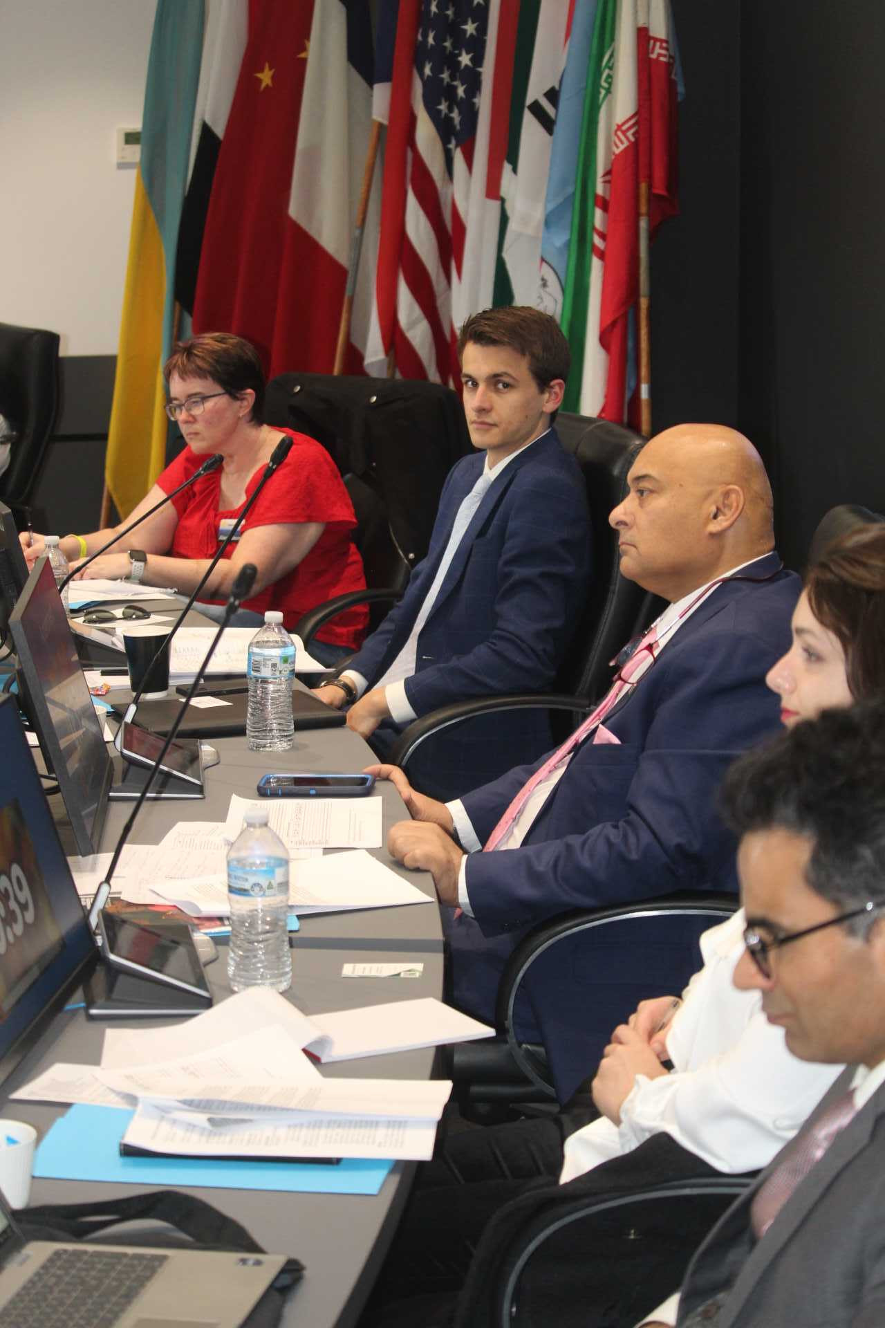 The judging panel at the 2025 Model United Nations, with Secretary General for the day, Joseph Brake (second from left) overlooking proceedings. (Photo: Antony Dubber)